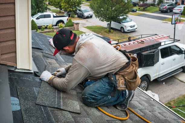 Professional Roofing technician working in Chase, PA
